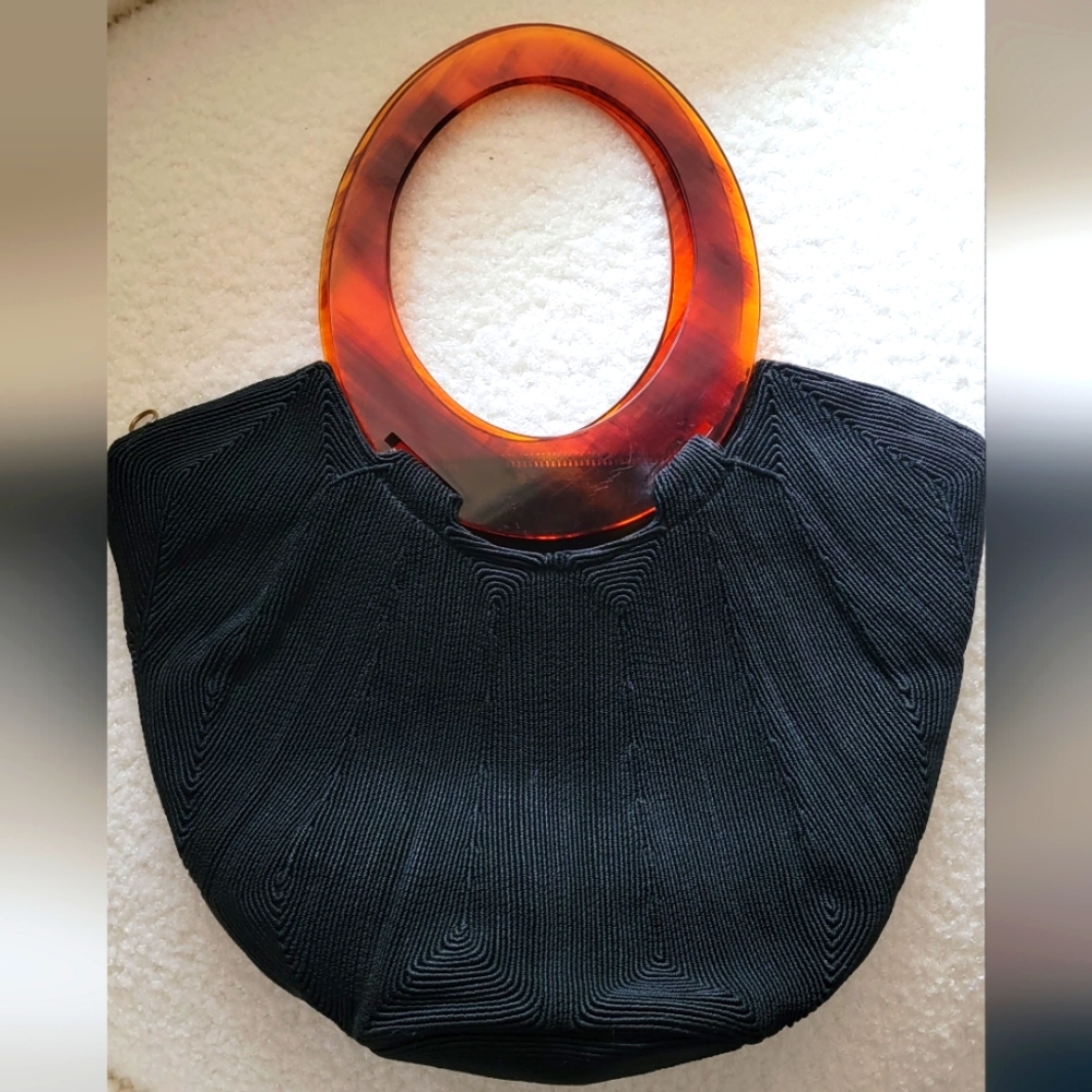 Vintage chic satin fabric design with brown plastic hoop handles clutch bag